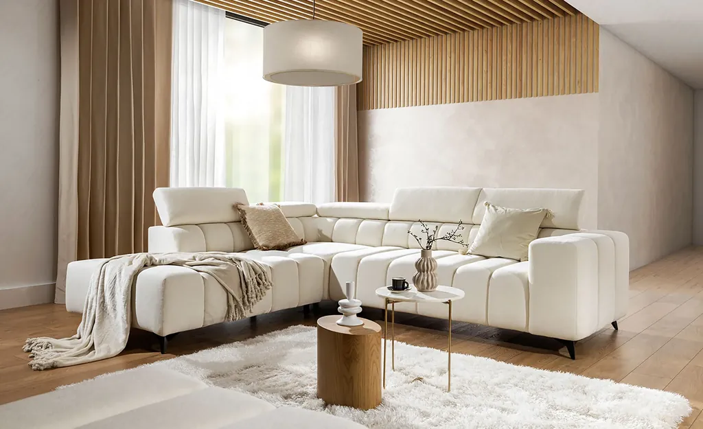 An ivory GUSTO corner sofa in a warm, timber-panelled living room